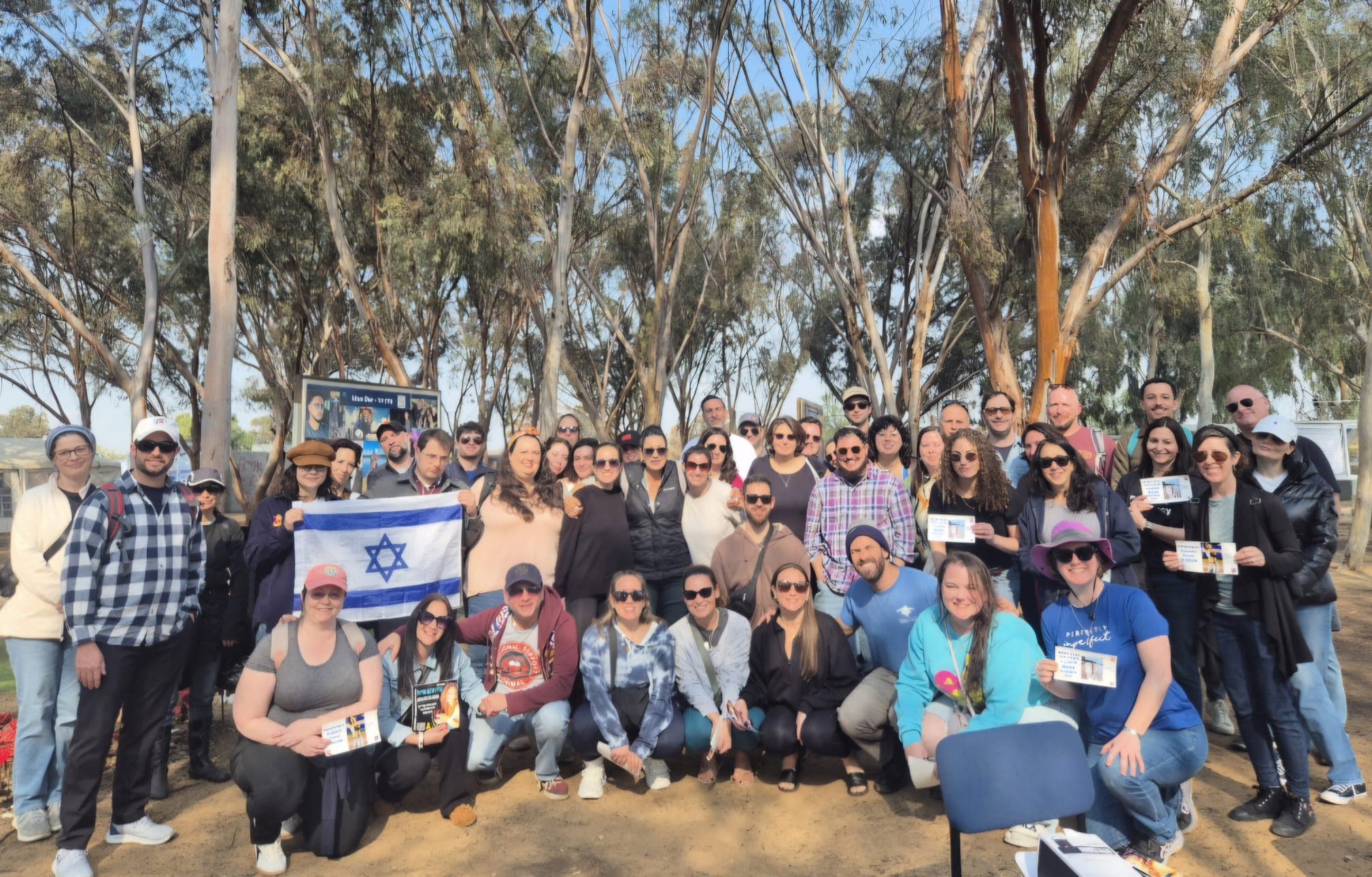 Tour group with Israeli flag at the Re’im site