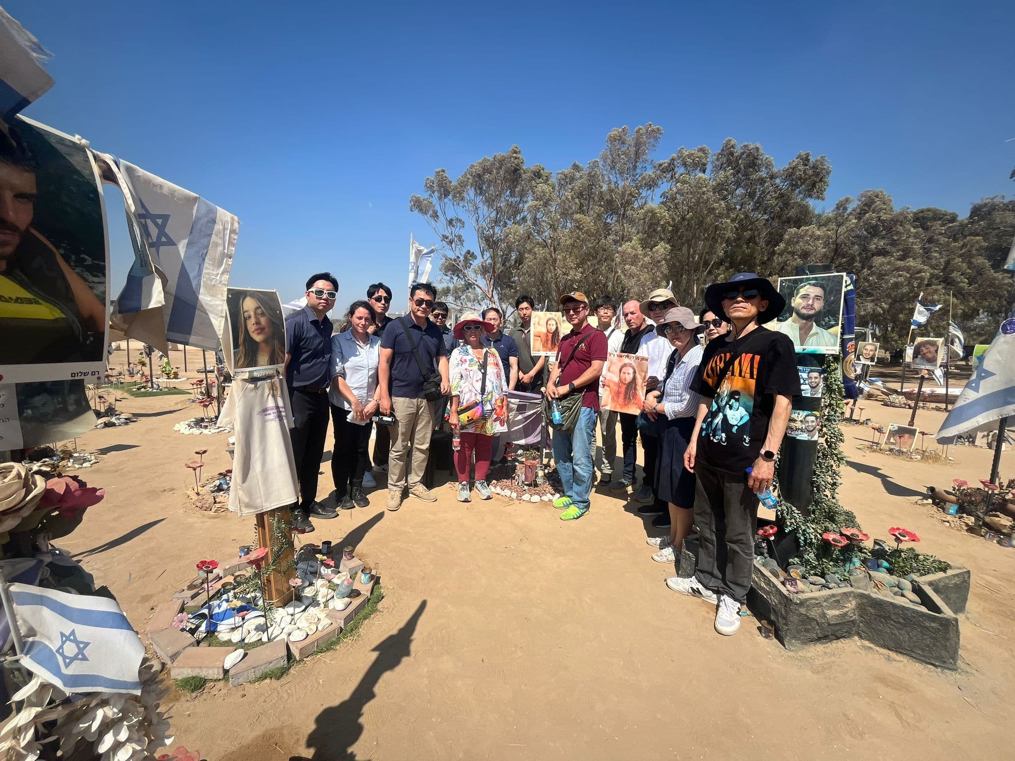 Tour group from Asia visiting the Re’im memorial